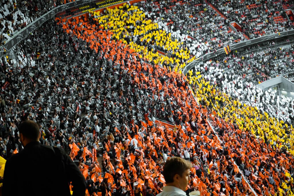 Vibrant fan sections create a striking pattern at a stadium in Munich.
